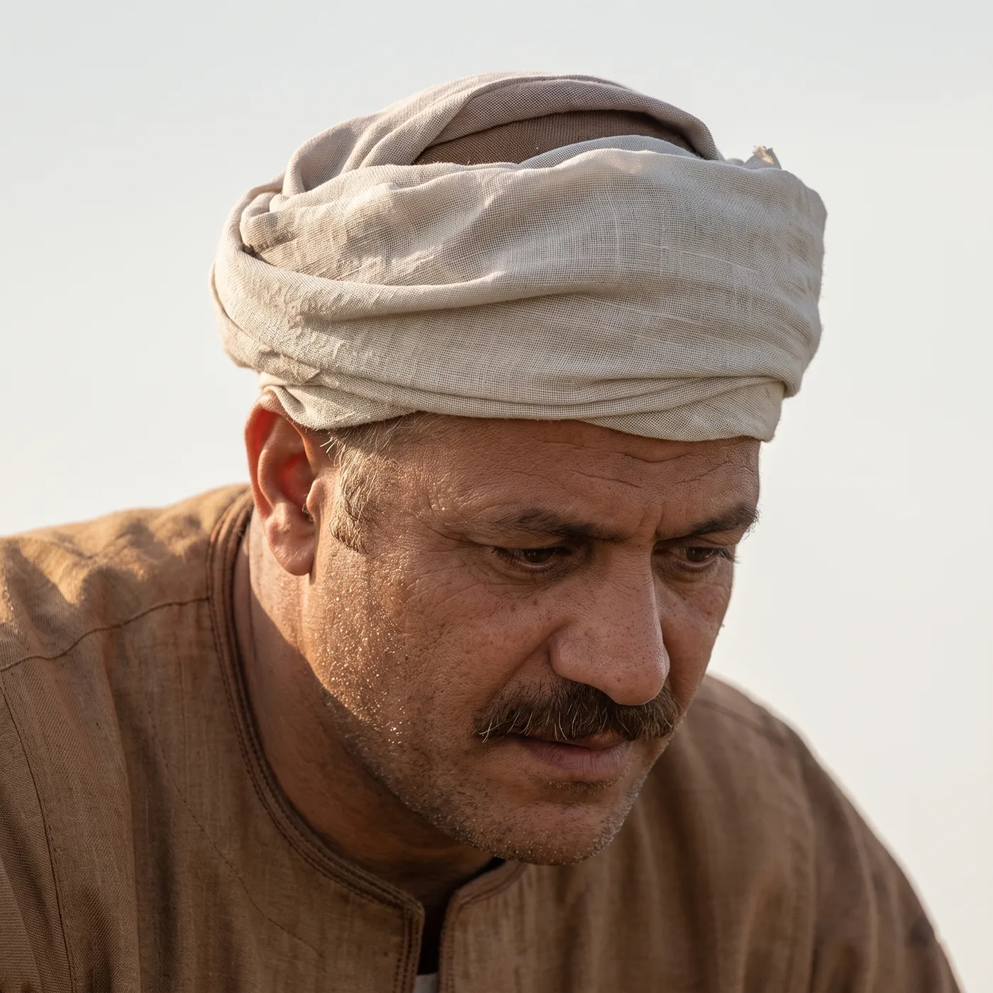 The same farmer after Detalia enhancement, with sharp facial details